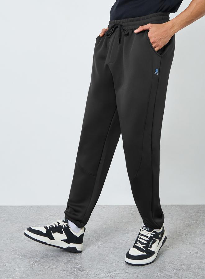Styli Men Black Oversized Paneled Patch Scuba Joggers - Image 1